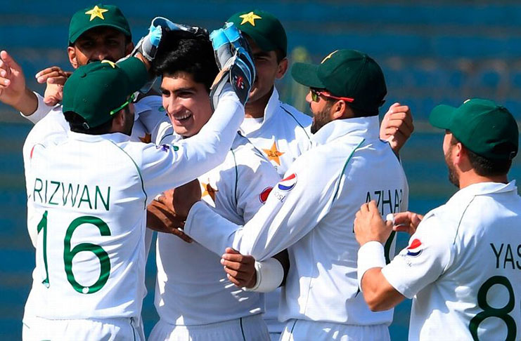 Naseem Shah is congratulated by his team-mates. ( AFP Getty Images)