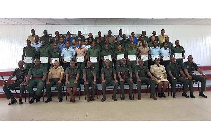 Seated: Senior military personnel with the graduates