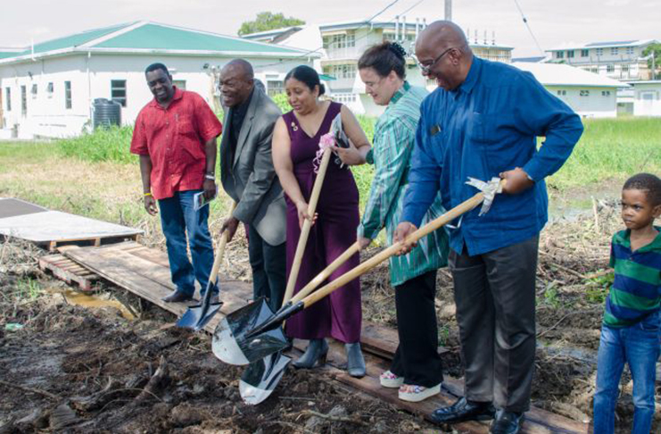 Finance Minister Hon Winston Jordan joins Professor Paloma
Mohamed Martin, UNICEF Country Rep. Sylvie Fouet and Dean Al
Creighton at the sod-turning