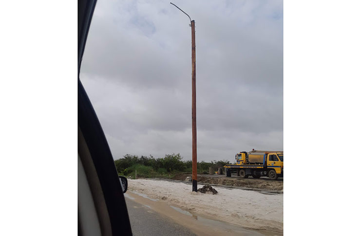 One of the street lights being installed at Plantation Providence, East Bank Demerara