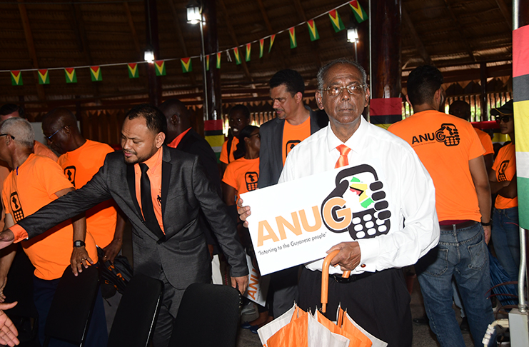 ANUG Presidential Candidate, Ralph Ramkarran displays a party sign during the submission of his party’s List of Candidates inside the Umana Yana (Adrian Narine photo)