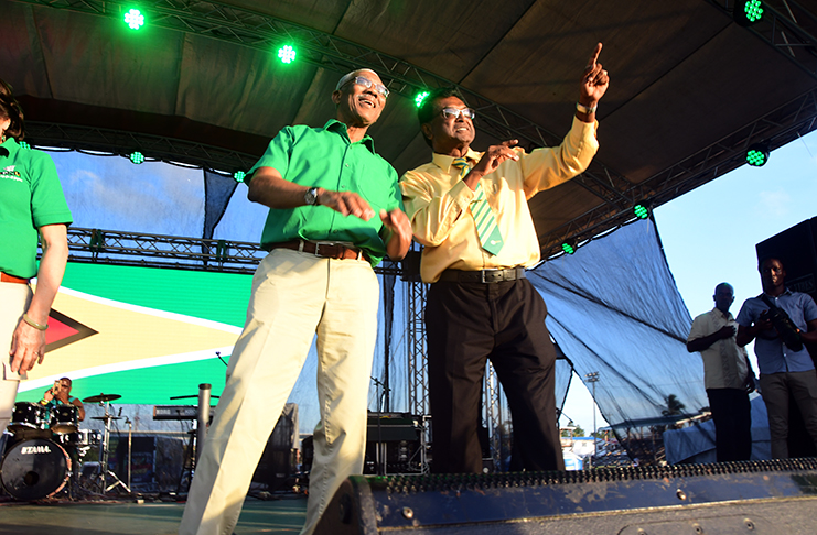 President, David Granger and Leader of the AFC, Khemraj Ramjattan, ‘crank-up’ the massive crowd during the launch of the APNU+AFC campaign, on Friday (Adrian Narine photo)