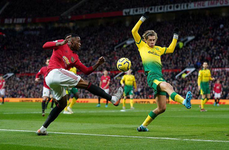 Manchester United's Aaron Wan-Bissaka in action with Norwich City's Todd Cantwell at Old Trafford, Manchester, Britain. (REUTERS/Jon Super)