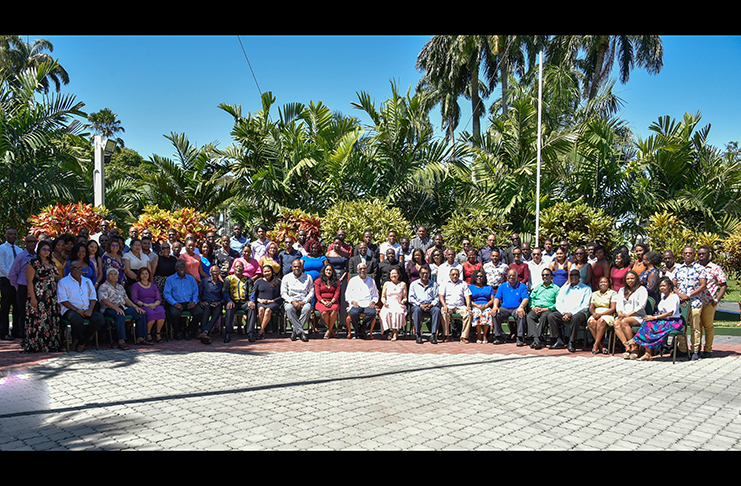 President David Granger (centre) and members of the government (front row) take a photograph with members of the media who attended the 2020 Annual Media Brunch to commemorate the 75th Anniversary of the GPA on Sunday.  (MoTP photo)