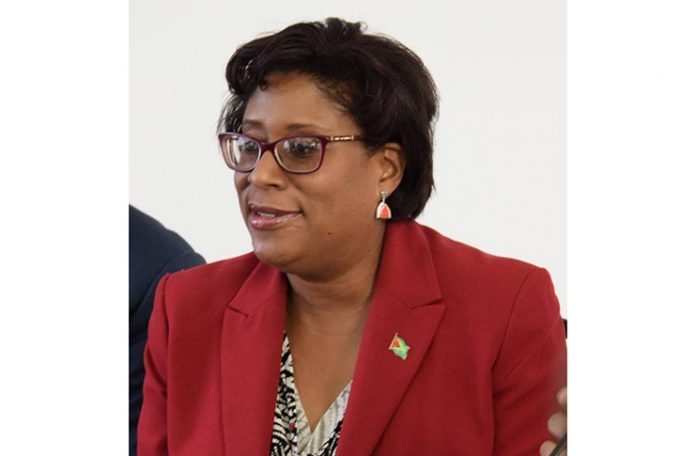 Minister of Public Telecommunications Catherine Hughes.