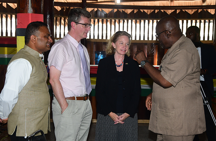 Chief Elections Officer, Keith Lowenfield in discussion with British High Commissioner, Greg Quinn (centre), US Ambassador Sarah-Ann Lynch and Indian High Commissioner, Dr. K. J. Srinivasa.