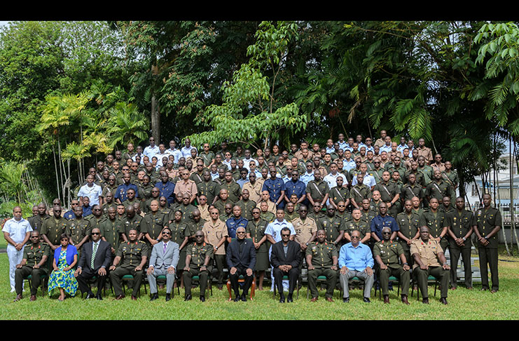 President David Granger (centre) is flanked by Vice President and Minister of Public Security, Khemraj Ramjattan; Chief of Staff, Brigadier Patrick West; and other Officers of the Guyana Defence Force pose for the traditional ‘family’ photo. Also in the photo are: Minister of Finance Winston Jordan, Attorney General Basil Williams and Director General Joseph Harmon.  
Photos by Delano Williams