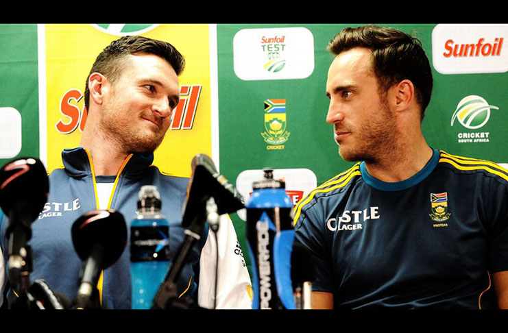 Graeme Smith and Faf du Plessis talk to each other at a press conference (Getty Images)
