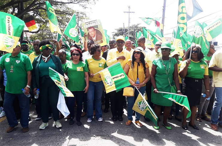 Top officials of the coalition joined supporters along the route to the Umana Yana.(Delano Williams photo)