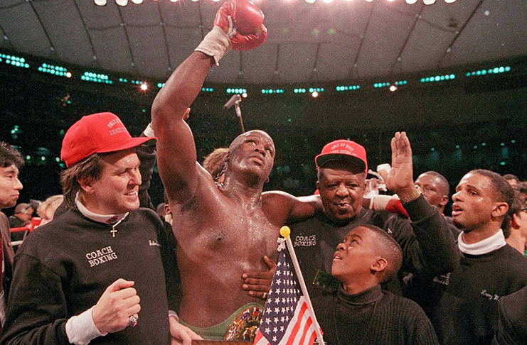 Buster Douglas celebrates his victory at the Tokyo Dome. (AP)