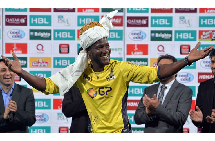 Darren Sammy goes traditional after Peshawar Zalmi's PSL title win in 2017.( AFP via Getty Images)