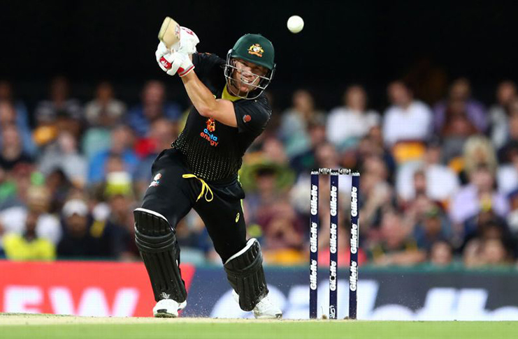 David Warner drives through the off side. (Getty Images)