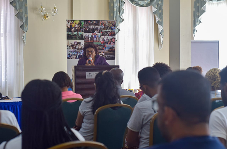 Chair of the Guyana Elections Commission (GECOM), Justice (Ret’d) Claudette Singh delivers remarks to youths of the Guyana National Youth Council (GNYC).
