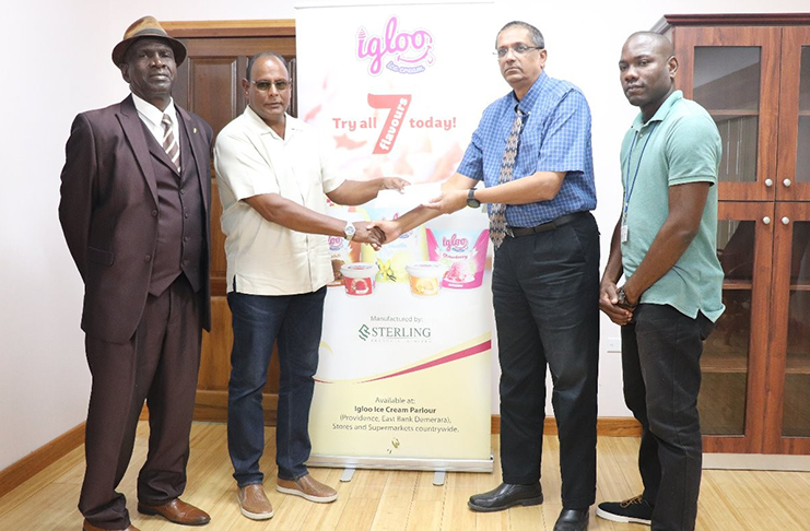 From left: Guy Griffith and Aasrodeen Shaw of LGC and Ramsey Ali and Mr Dellon Lynch of Sterling Products Ltd.
