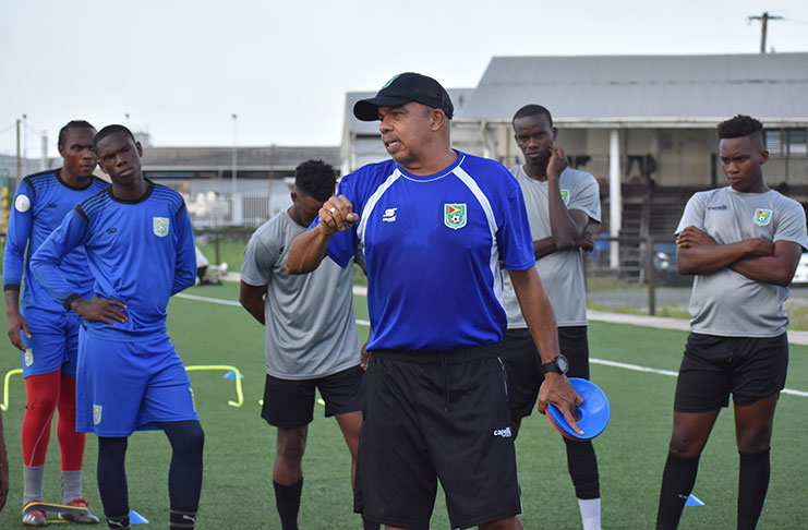 Golden Jaguars head coach, Márcio Máximo, engaging members of the locally-based senior squad at a recent training session. (Photo compliments: GFF)