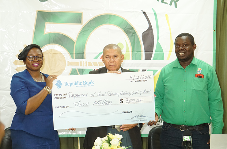 Ms Jonelle Dummett, Acting Manager, Communications Department of Republic Bank Limited; Minister of Social Cohesion, Culture, Youth and Sport, Dr George Norton, along with the Mashramani Coordinator Andrew Tyndall during the presentation of three million dollars to fund the Pan-O-Rama Steel Pan Competition