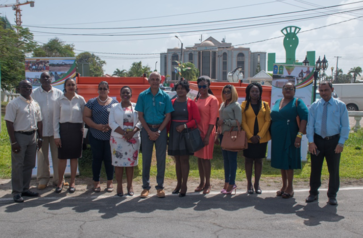 Minister of Communities, Ronald Bulkan (sixth from left); Mayor of Linden, Waneka Arrindell (fifth from left); Lethem Councillor, Ubol McDonald (second from right); Anna Regina, Town Clerk, Diane Critchlow (sixth from right); Head of Sanitation Management Unit, Gordon Gilkes (second from left); and Emil McGarrell, Permanent Secretary, Ministry of Communities with other officials (DPI photo)