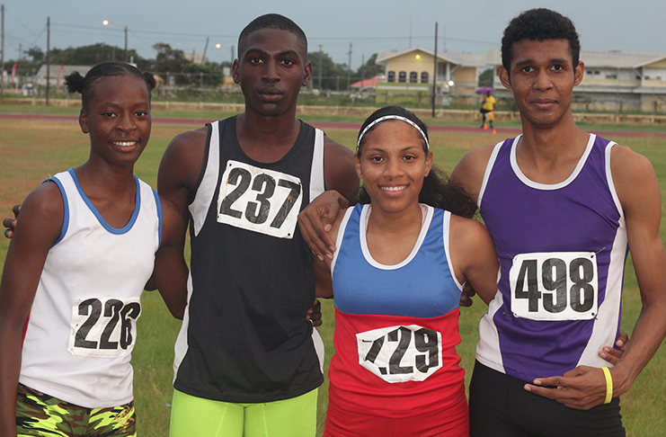 Police Progressive Youth Club mixed 19-and-under 4x 400M relay winners: (l-r) Odessa France, Courtly Bobb, Donna Lowe and Dinero Persaud.