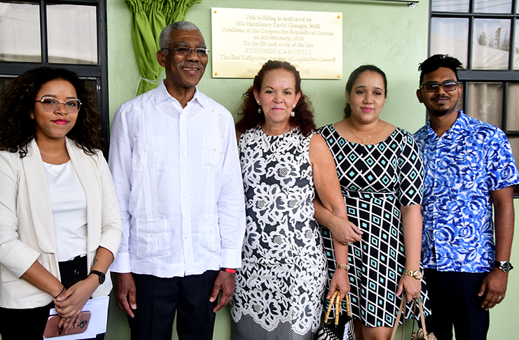 President David Granger (second left) with Stephen Campbell's granddaughter, Anna Correia Bevaun (third right) and his great-granddaughters Naiomi Bevaun (left) and Gabrielle Parsram (second right), who was accompanied by her husband Shawn Parsram (right). (Adrian Narine photo)