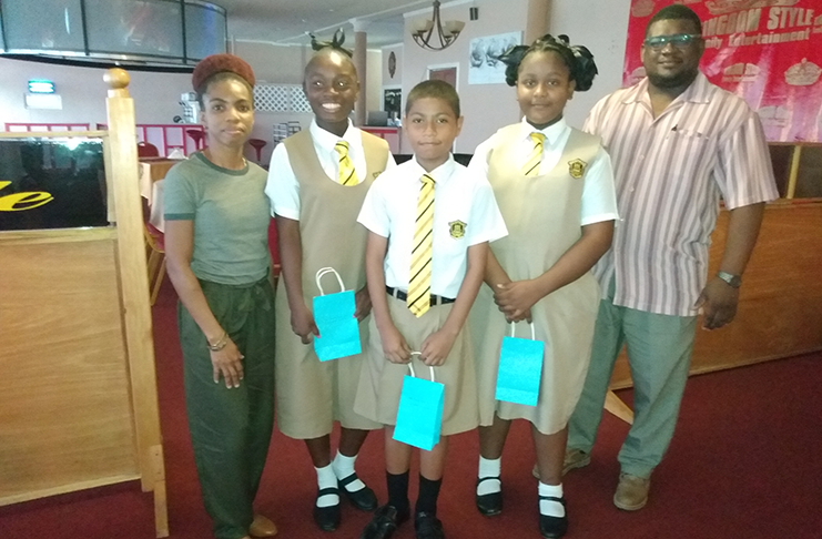 From left are Ms Sonja McKinnon of the Linden Chapter of the Edward Screw Richmond Foundation, students Taniya Spencer, Ravi Rayman, Jasmine Simpson and Kevin Dejonge.