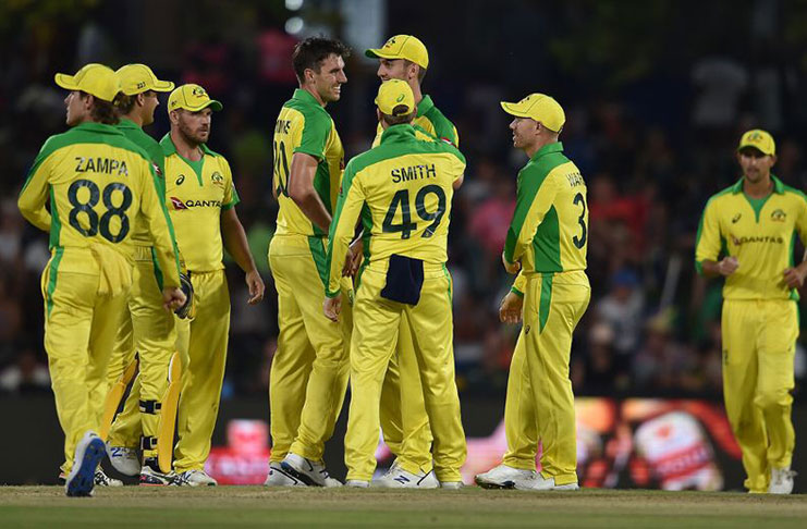 Australia celebrate Pat Cummins' breakthrough. (Gallo Images/Getty Images)