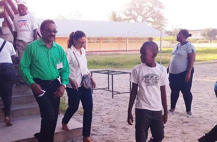 Attorney General Basil Williams at Lodge Secondary School, along with immediate members of his family