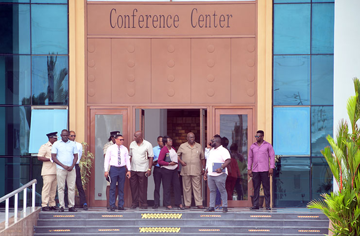 PPP/C's Executive Secretary, Zulfikar Mustapha (first) arrives at the center (Adrian Narine photo)