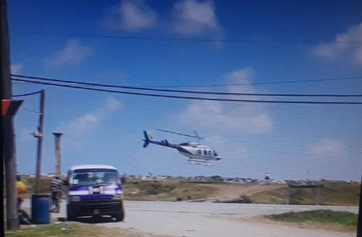 The helicopter as it took off from the scene.