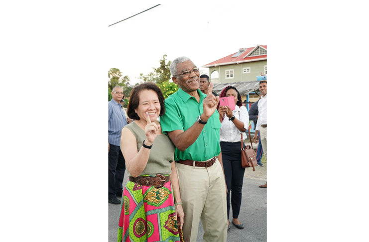 President David Granger and First Lady, Sandra Granger shortly after voting at the Pearl Nursery School on the East Bank of Demerara on Monday morning. (MoTP photo)