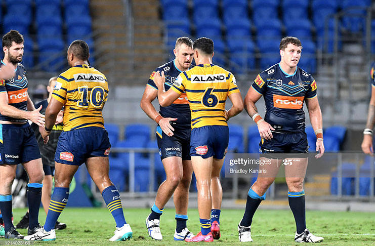 Players shake hands after the round 2 NRL match between the Gold Coast Titans and the Parramatta Eels at Cbus Super Stadium on March 22, 2020 in Gold Coast, Australia. (Photo by Bradley Kanaris/Getty Images)