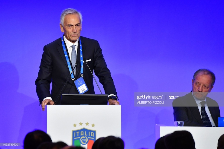 President of the Italian Lega Pro, and only candidate for presidency of the Italian Football Federation, Gabriele Gravina (L) delivers a speech as Chairman of the Italian Football Managers' Association, Renzo Ulivieri looks on during the elective assembly of the Italian Football Federation (FIGC) on October 22, 2018 at the Hilton hotel of Rome's Fiumicino airport. (Photo by Alberto PIZZOLI / AFP)        (Photo credit should read ALBERTO PIZZOLI/AFP via Getty Images)