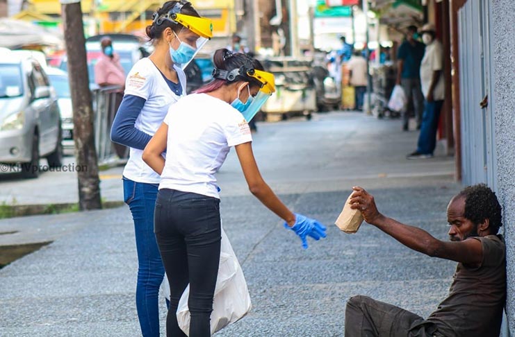 Miss World Guyana candidates helping the homeless