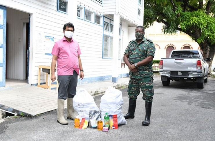 (left) Mayor of Georgetown, His Worship Ubraj
Narine, and (right) Senior Response Officer of the
CDC, Captain Salim October