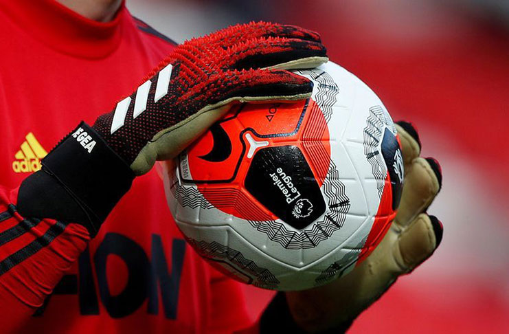 Old Trafford, Manchester, Britain - February 23, 2020 General view of a match ball held by Manchester United's David de Gea during the warm up before the match Action Images via Reuters/Lee Smith.