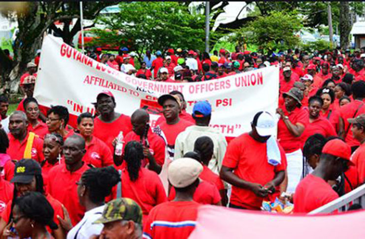 Web scenes of past Labour Day marches in Guyana
