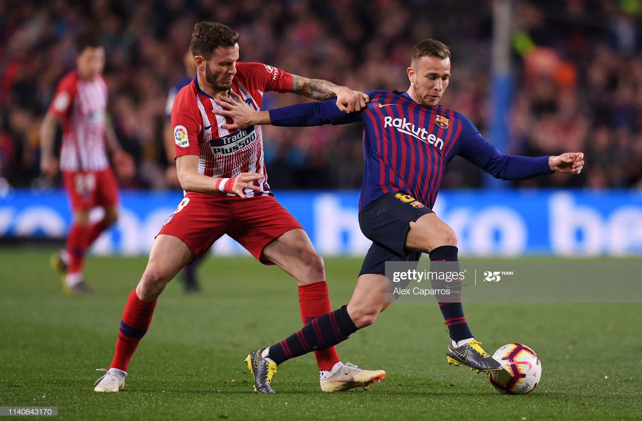 Arthur of Barcelona holds off Saul Niguez of Atletico Madrid during the La Liga match between FC Barcelona and Club Atletico de Madrid at Camp Nou on April 06, 2019 in Barcelona, Spain. (Photo by Alex Caparros/Getty Images)