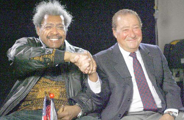 Boxing promoters Don King (left) and Bob Arum
