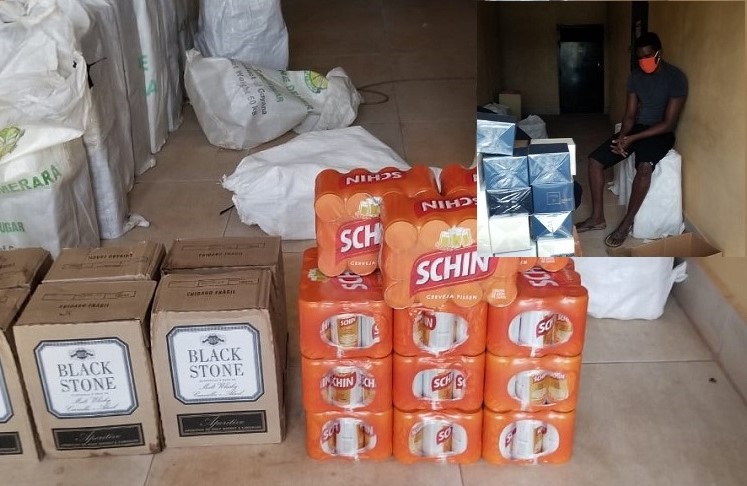 A quantity of alcoholic beverages which the man attempted to smuggled into Guyana from Brazil.Inset is the accused following his arrest.