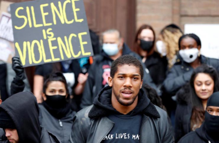 Heavyweight boxing world champion Anthony Joshua joined a march through the streets of his home town of Watford. Photograph: Paul Childs/Reuters
