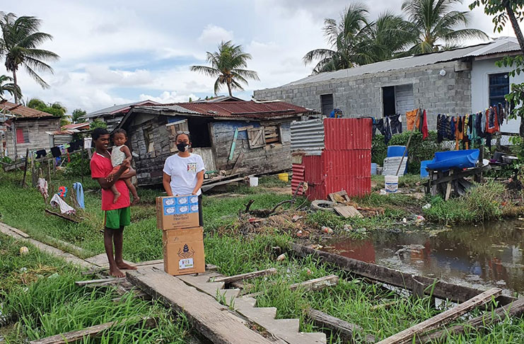 One of the many families receiving their hampers during the distribution exercise