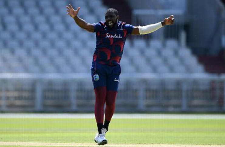 Raymon Reifer appeals successfully for the wicket of Jason Holder. (Gareth Copley/Getty Images)