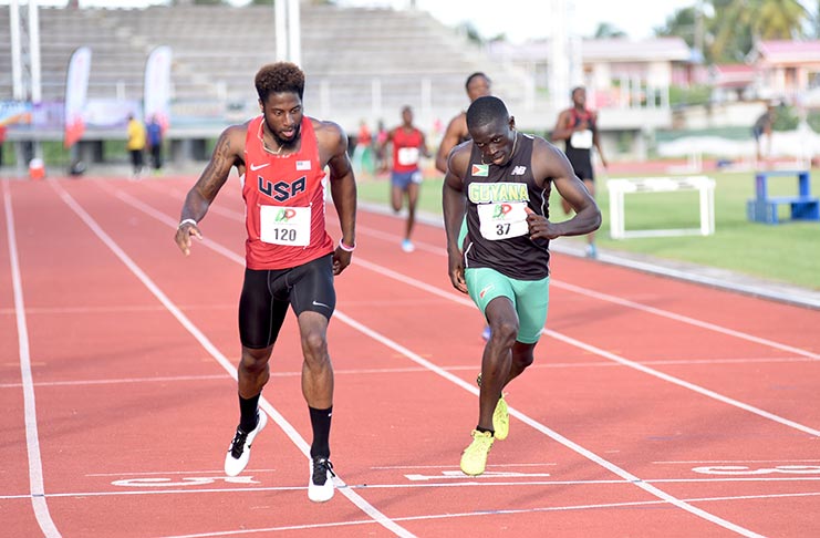 Guyana's Winston George (right) in action during the Aliann Pompey Invitational.