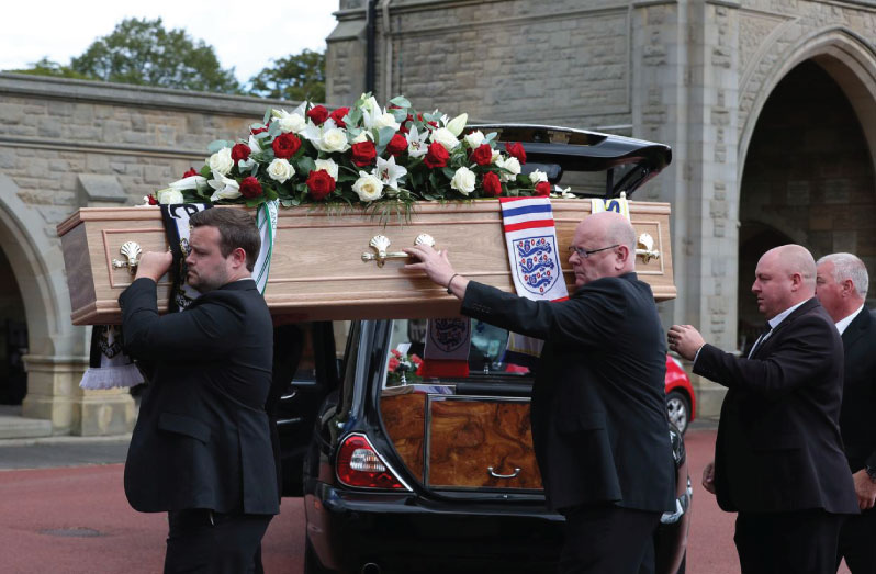 The coffin of Jack Charlton, the former Republic of Ireland soccer team manager, who won the World Cup playing for England, is taken for his funeral in Newcastle, Britain, July 21, 2020. (Peter Byrne/Pool via REUTERS)