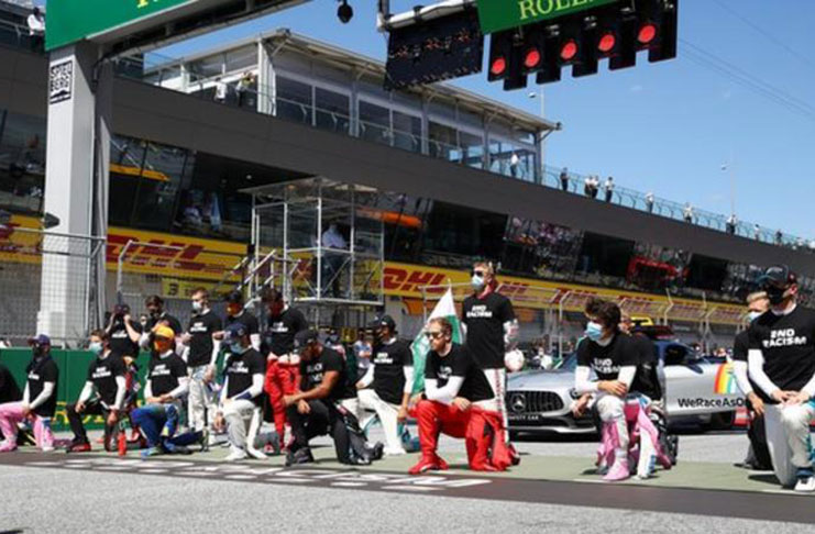 Drivers display their own interpretation of a stance against racism