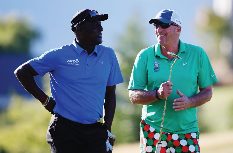 Sir Vivian Richards (left) and Sir Ian Botham