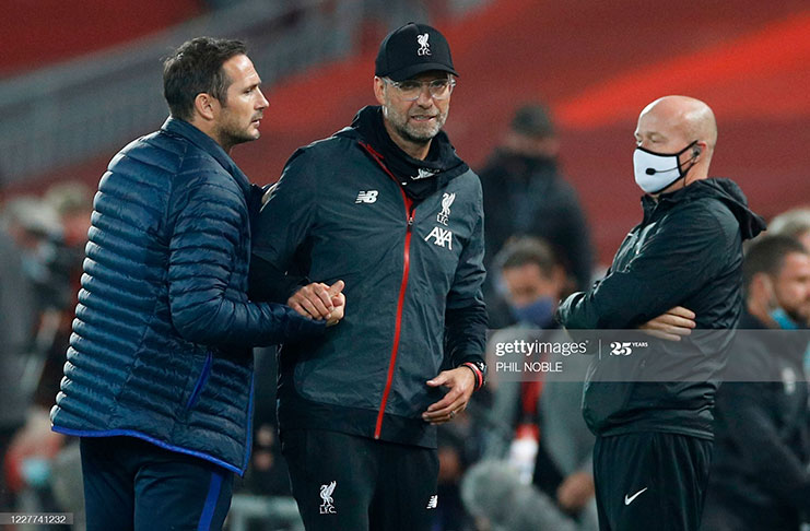 Chelsea's English head coach Frank Lampard (L) greets Liverpool's German manager Jurgen Klopp (R) at the end of the English Premier League football match at Anfield in Liverpool, north-west England on July 22, 2020. (Photo by PHIL NOBLE/POOL/AFP)