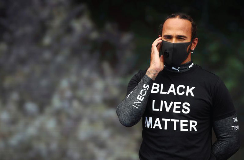 Formula One F1 - Hungarian Grand Prix - Hungaroring, Budapest, Hungary - July 19, 2020 Mercedes' Lewis Hamilton wearing a t-shirt in support of the Black Lives Matter campaign before the race Mark Thompson/Pool via REUTERS
