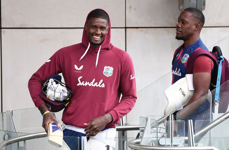Jason Holder and Nkrumah Bonner head to the nets, Old Trafford, yesterday.