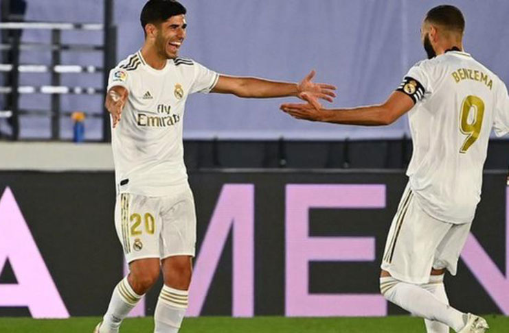 Karim Benzema (right) scored Real's first and assisted Marco Asensio (left) for the second.