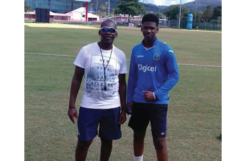 Ex-Guyana /National youth coach Garvin Nedd (left) and son, Ashmead
